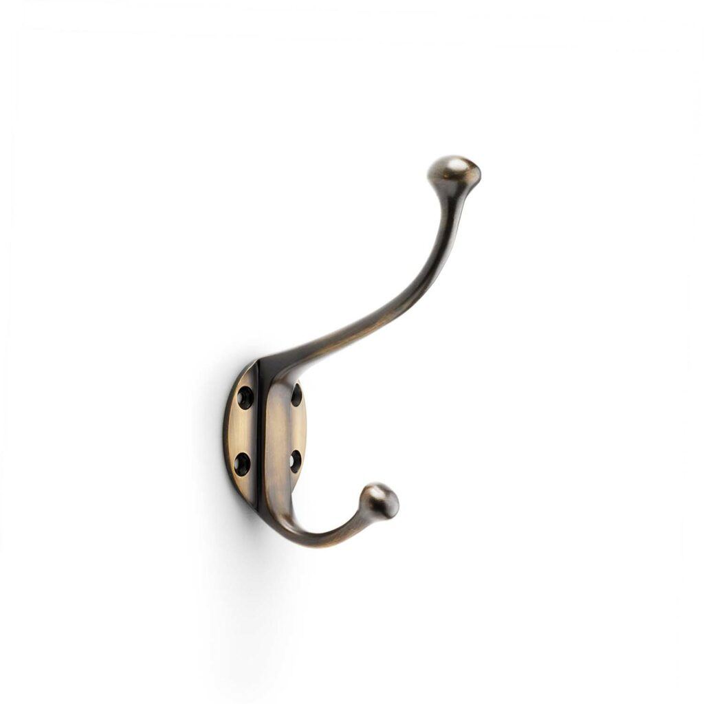 A Alexander and Wilks antique brass traditional coat hook.