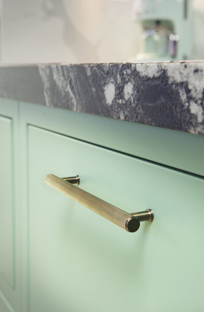 Green kitchen with Dark Bronze PVD Reeded handles | 2023 trends blog | More Handles