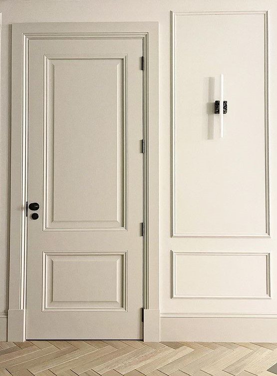 More Handles customer image of a dark bronze door knob and thumbturn on off white carpentry. 