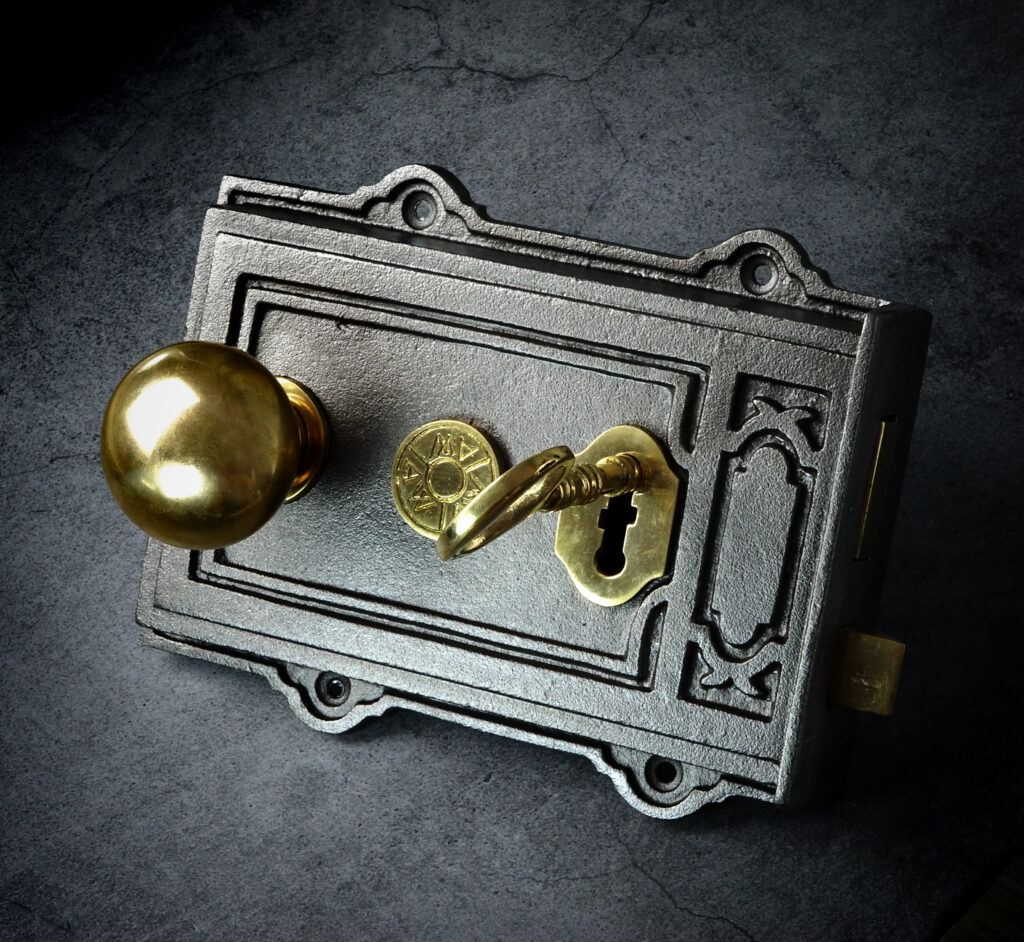 Alexander & Wilks Keswick Rim Lock and Kershaw door knob in Unlacquered Brass shot by Tony Seal