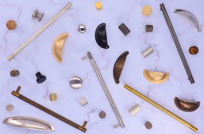 A collection of Alexander and Wilks hardware on a blue marble background

