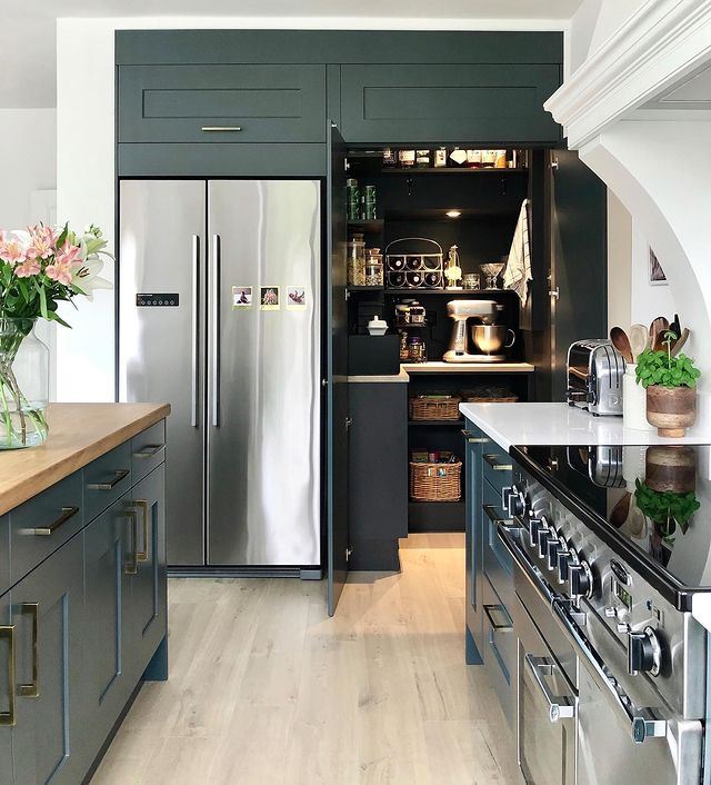 @firstsenseinteriors Leon House project featuring square or "block" cabinet handles on a blue kitchen