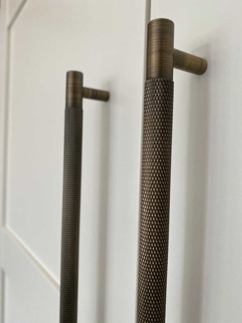 @the_long_barn_'s close up of cabinets featuring Alexander & Wilks Antique Brass Brunel Knurled Handles